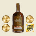 Bottle of Wenzel Distillery Whiskey Wheated Barrel Proof Blend of Straight Bourbon Whiskeys 750ml with San Francisco World Spirits Competition 2024, 2025 and 2026 Gold Medals plus World Whiskies Awards 2024 Gold Award.
